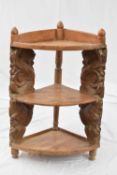 Indian hardwood corner whatnot with carved side supports, 82cm high