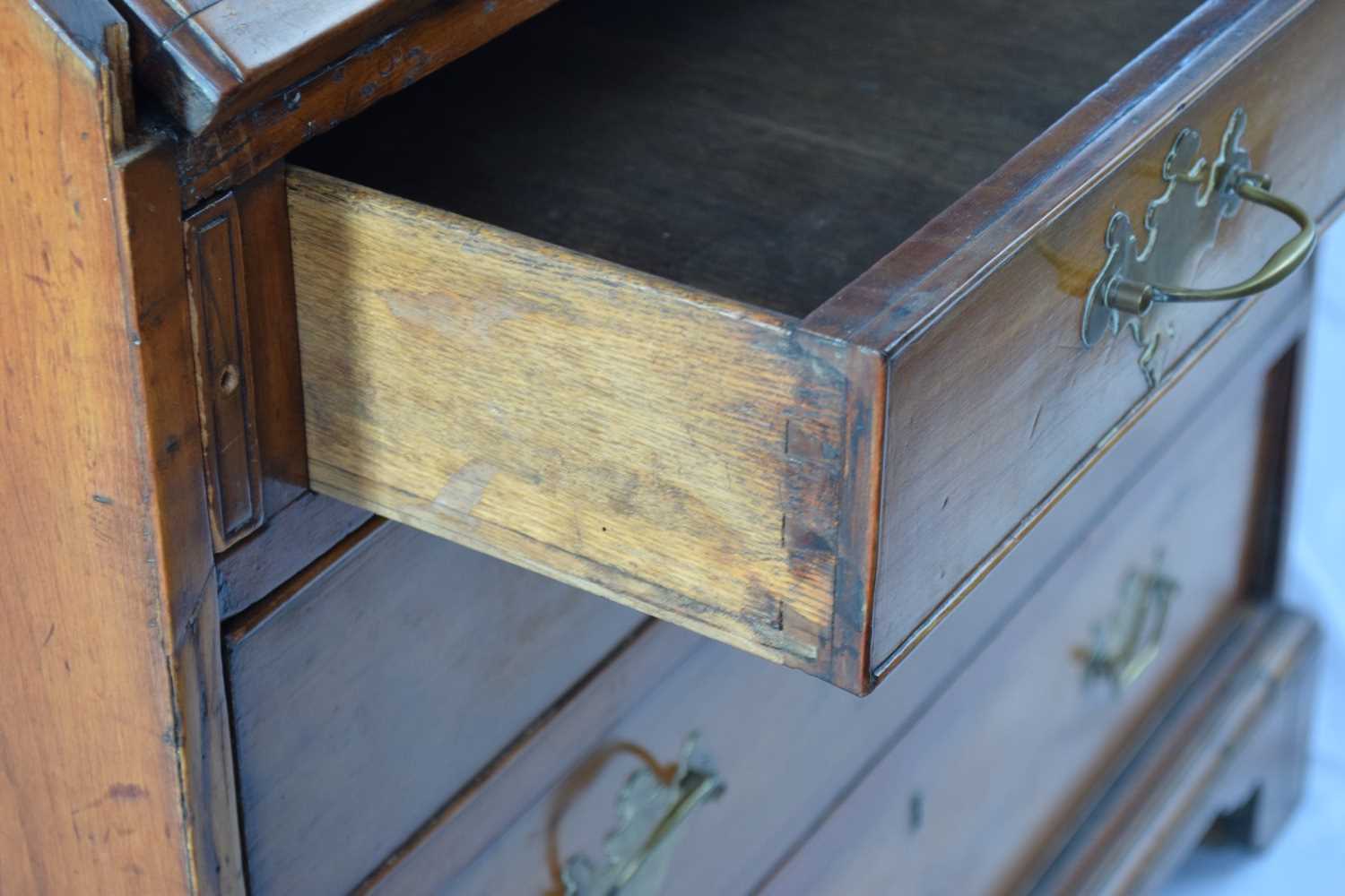 George III faded mahogany bureau with fall front opening to a shelved interior over four long - Image 5 of 7