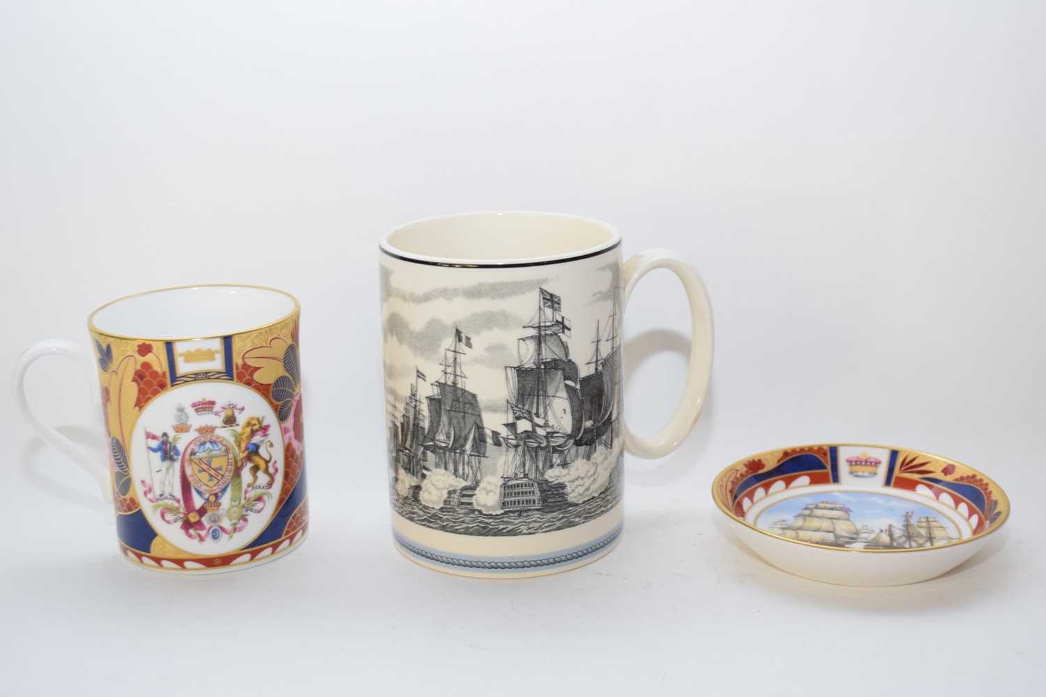 Wedgwood tankard modelled with a print of the Battle of Trafalgar, together with a Nelson collection