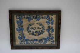 19th century beadwork embroidery decorated with garlands of blue flowers and pearls, signed to