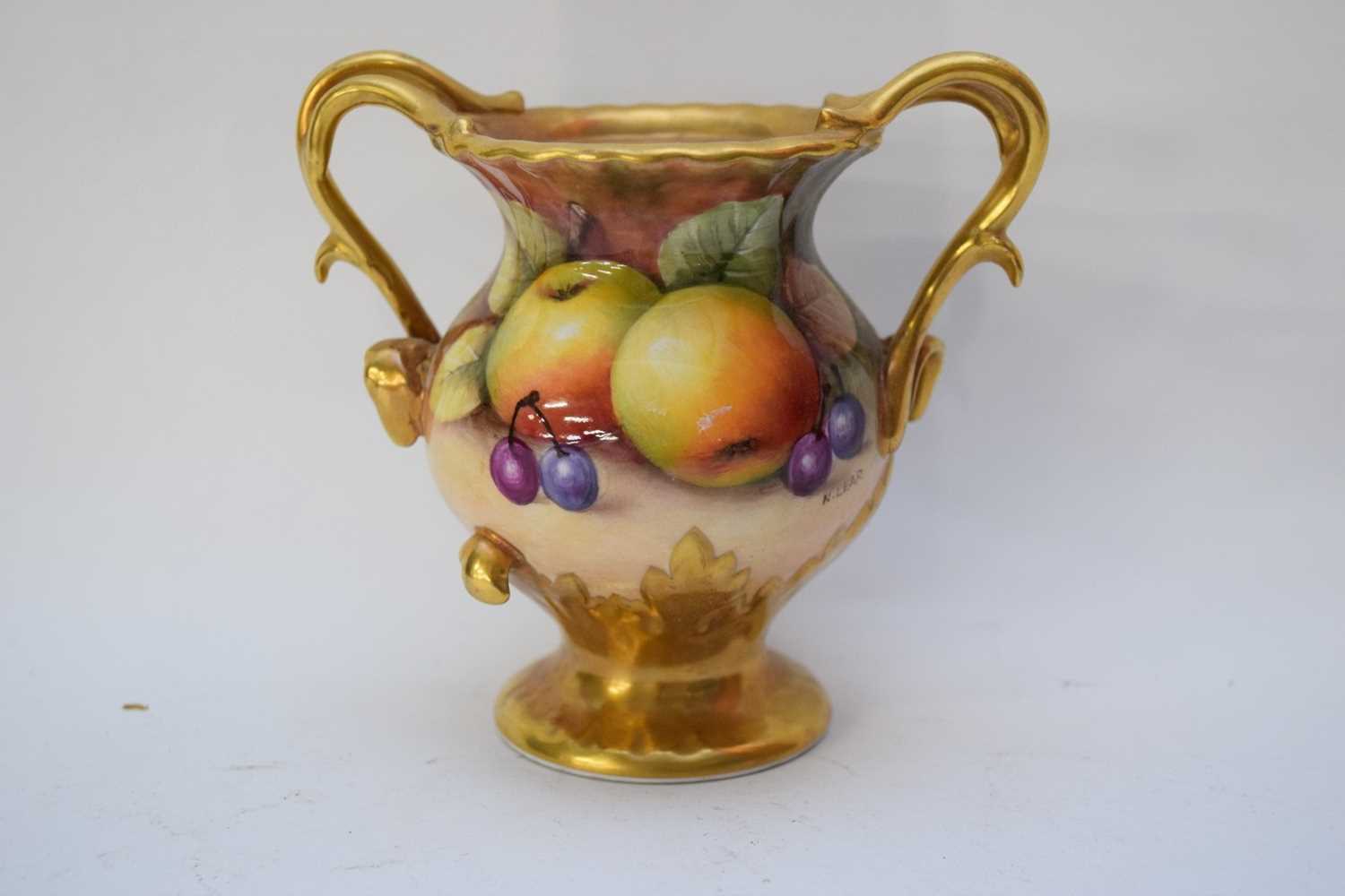 Coalport vase with gilt handles painted with fruit, signed by N Lear