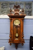 19th century Vienna wall clock, the architectural case with eagle mount and glazed door, the dial