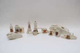 Quantity of crested wares including a large model of a WWI tank with arms for Southport by Arcadian,