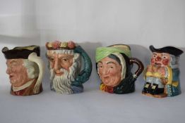 Group of character jugs, Royal Doulton Sari Gamp, Sam Johnson, Neptune and a Clarice Cliff