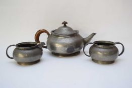 Pewter Tudric tea pot, milk jug and sugar bowl made for Liberty & Co