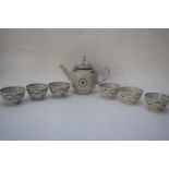 Group of 18th century Chinese export tea wares comprising tea pot and cover with floral design and