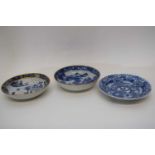 Group of three 18th century Qianlong period saucers with blue and white designs (3)