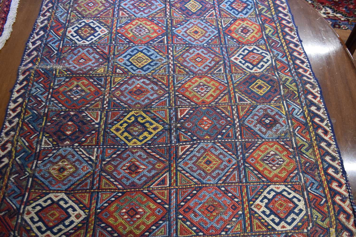 Middle Eastern saddlebag decorated with geometric design of lozenges on a principally red and blue - Image 3 of 6