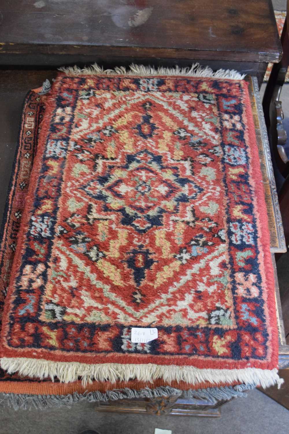 Two small Middle Eastern wool prayer mats, both decorated with central lozenges on a principally red - Image 2 of 4