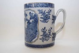 Late 18th century Chinese blue and white export tankard with a island scene and intertwined strap