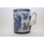 Late 18th century Chinese blue and white export tankard with a island scene and intertwined strap