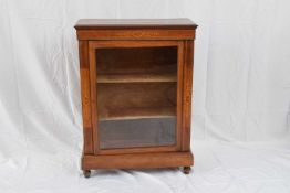 Victorian walnut veneered and inlaid pier cabinet with single glazed door open to an interior with