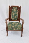 Late Victorian mahogany framed armchair, the back decorated with inlaid floral detail and