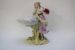 Art Nouveau style sweetmeat dish modelled as a maiden with dish by her side on a lily pad, 30cm