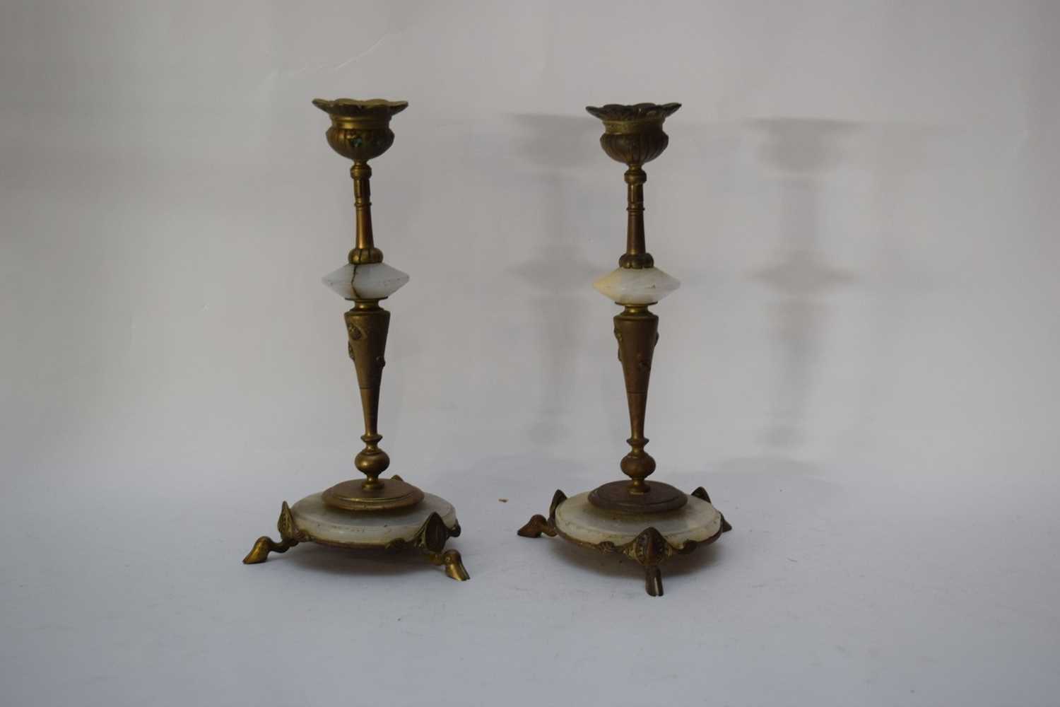 Pair of brass candlesticks with onyx mounts