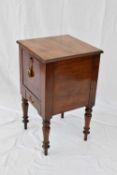 19th century mahogany pot cupboard with drop down door and single drawer to base, raised on turned