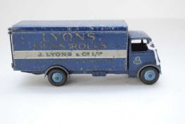 Dinky Supertoys Guy van No 514 as J Lyons in dark blue livery with grey band and pale blue wheels (