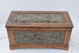 Victorian pine framed blanket box, the lid and front incorporating carved oak panels of an earlier
