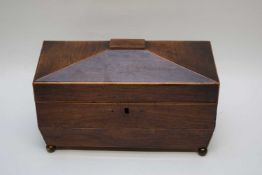 Small 19th century mahogany sarcophagus formed tea caddy, the interior with later fabric lining,