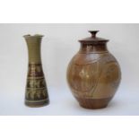 Two items of Studio pottery including a ewer with ribbed design, indistinct potters mark and further