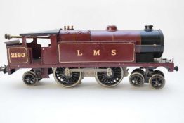 Hornby clockwork train marked LMS, No 2180 in maroon livery