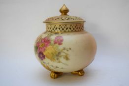 Royal Worcester globular vase with reticulated neck and cover, the blush ground decorated with