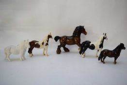 Group of five smaller size Beswick ponies including a Shetland, a Pinto, and a Pinto pony (5)