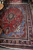 Rich red ground full pile Persian Serouke Carpet, floral medallion design 296cm x 200cm