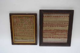 Two 19th century needlework samplers decorated with rows of letters and numbers, one signed 'Phebe