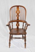 19th century elm seated stick back Windsor chair raised on turned legs with H stretcher