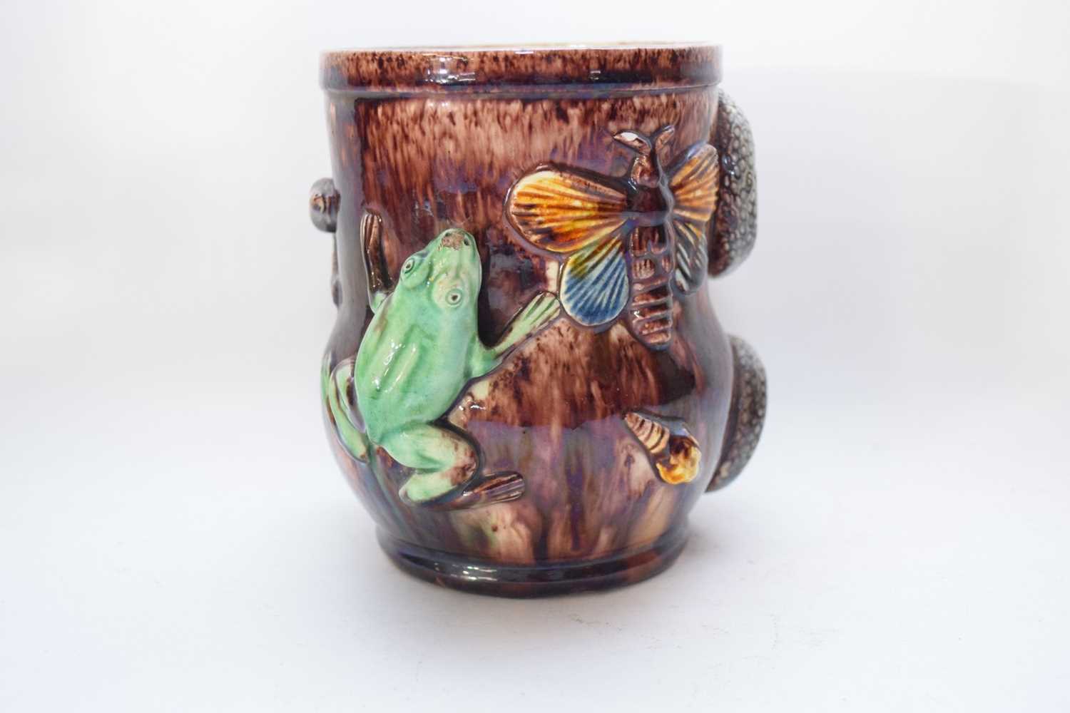 Continental majolica style vase modelled in relief with a green frog, insects and a snake in