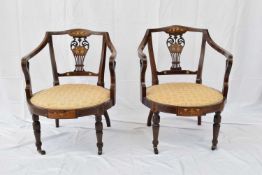 Pair of Edwardian mahogany framed inlaid bow back side chairs with circular seats raised on turned