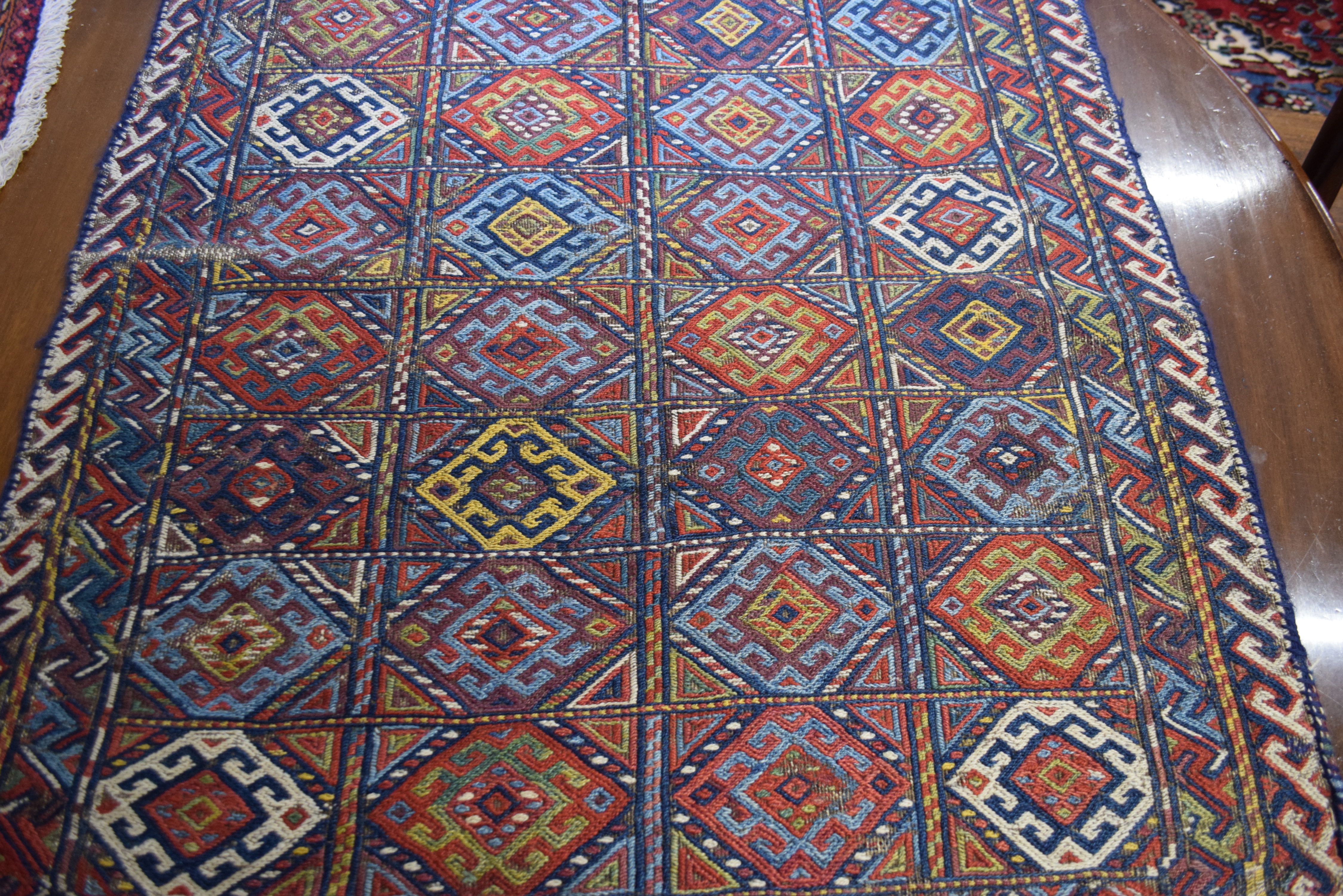 Middle Eastern saddlebag decorated with geometric design of lozenges on a principally red and blue - Image 4 of 6