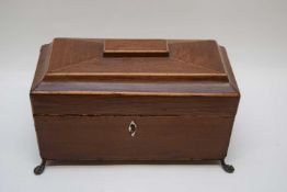 Georgian mahogany sarcophagus formed tea caddy with hinged lid and sub-divided interior, raised on