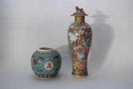 Cantonese porcelain vase and cover decorated in typical fashion with Chinese figures seated at a