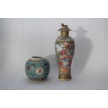 Cantonese porcelain vase and cover decorated in typical fashion with Chinese figures seated at a