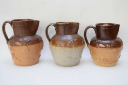 Quantity of three 19th century salt glaze jugs including a Kishere pottery example with riveted