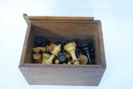 Large box containing wooden Staunton type chess pieces