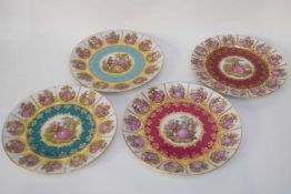 Group of four Continental porcelain plates, all with Meissen style designs of figures in landscapes,