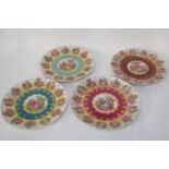 Group of four Continental porcelain plates, all with Meissen style designs of figures in landscapes,