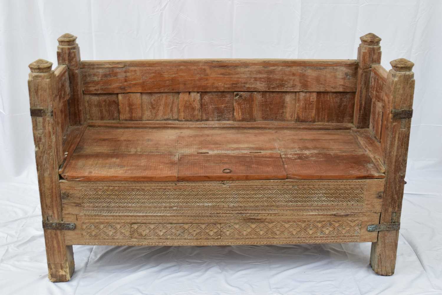 Indian hardwood settle with storage base and panelled sides, 145cm wide