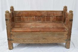 Indian hardwood settle with storage base and panelled sides, 145cm wide
