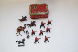 Small tin box containing quantity of lead soldiers, some Britains