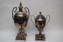 Two 19th century silver plated samovars or tea urns, both with looped handles and raised on square