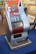 Vintage one-armed bandit fruit machine with electric supply, 69cm high