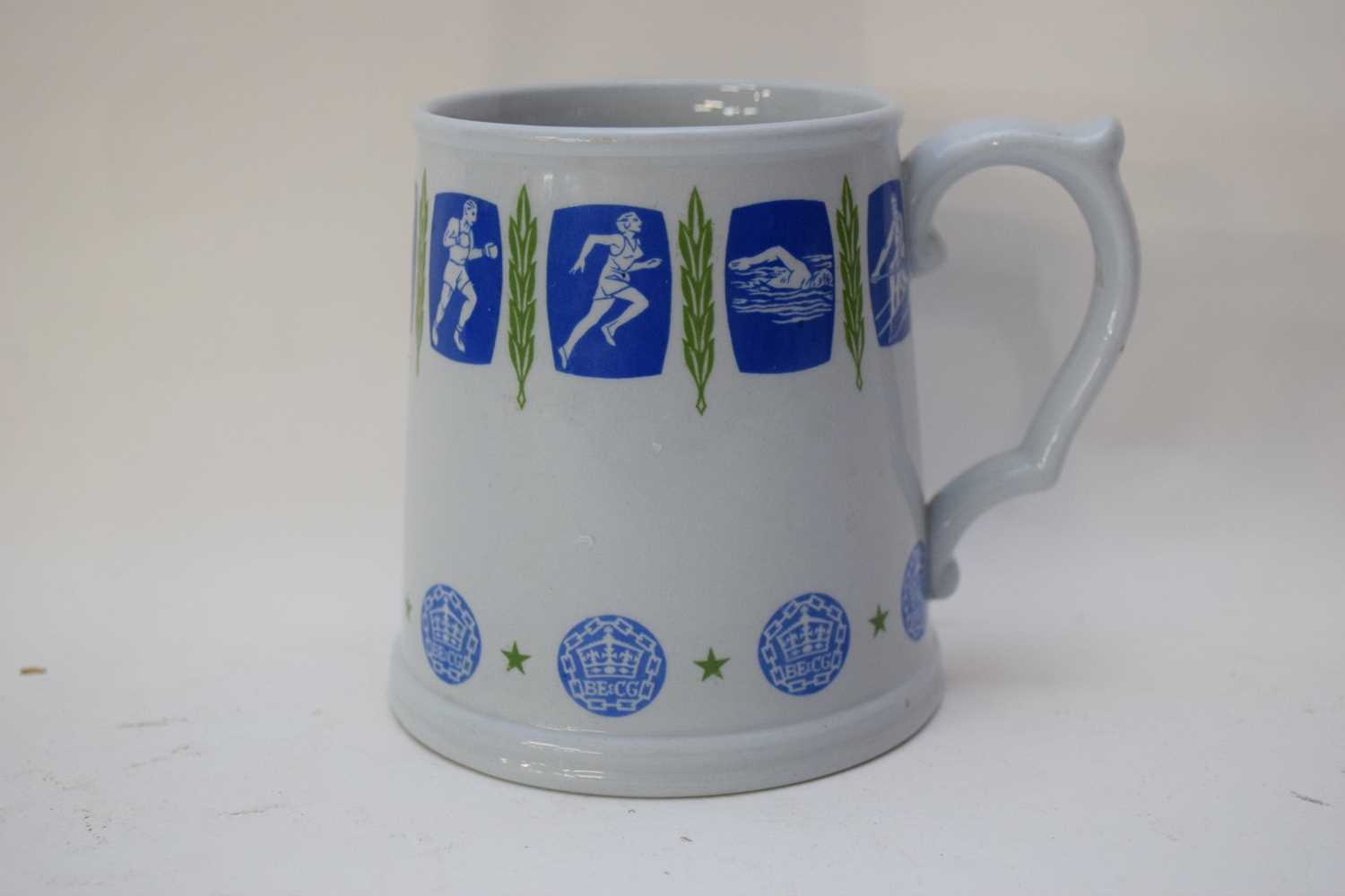 Copeland Spode mug, the light blue ground with various figures in athletic pursuits, the base marked