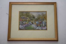 Ellen Warrington (British 20th Century), An English Summer Garden. Watercolour on paper, signed.