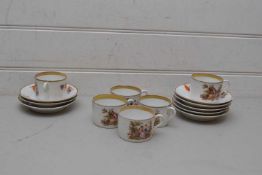 COLLECTION OF CONTINENTAL FLORAL DECORATED COFFEE CANS AND SAUCERS