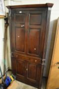 GEORGE III OAK FOUR DOOR FLOOR STANDING CORNER CABINET WITH CENTRAL DRAWER, 190CM HIGH