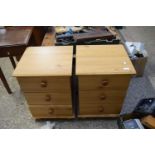 PAIR OF PINE EFFECT THREE DRAWER BEDSIDE CABINETS